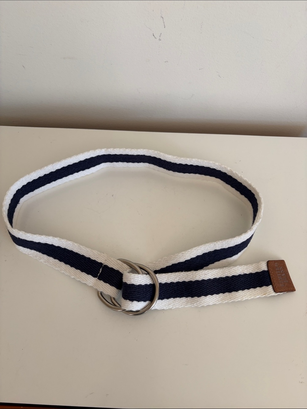 The Limited Navy and White Striped D-Ring Fabric Belt.